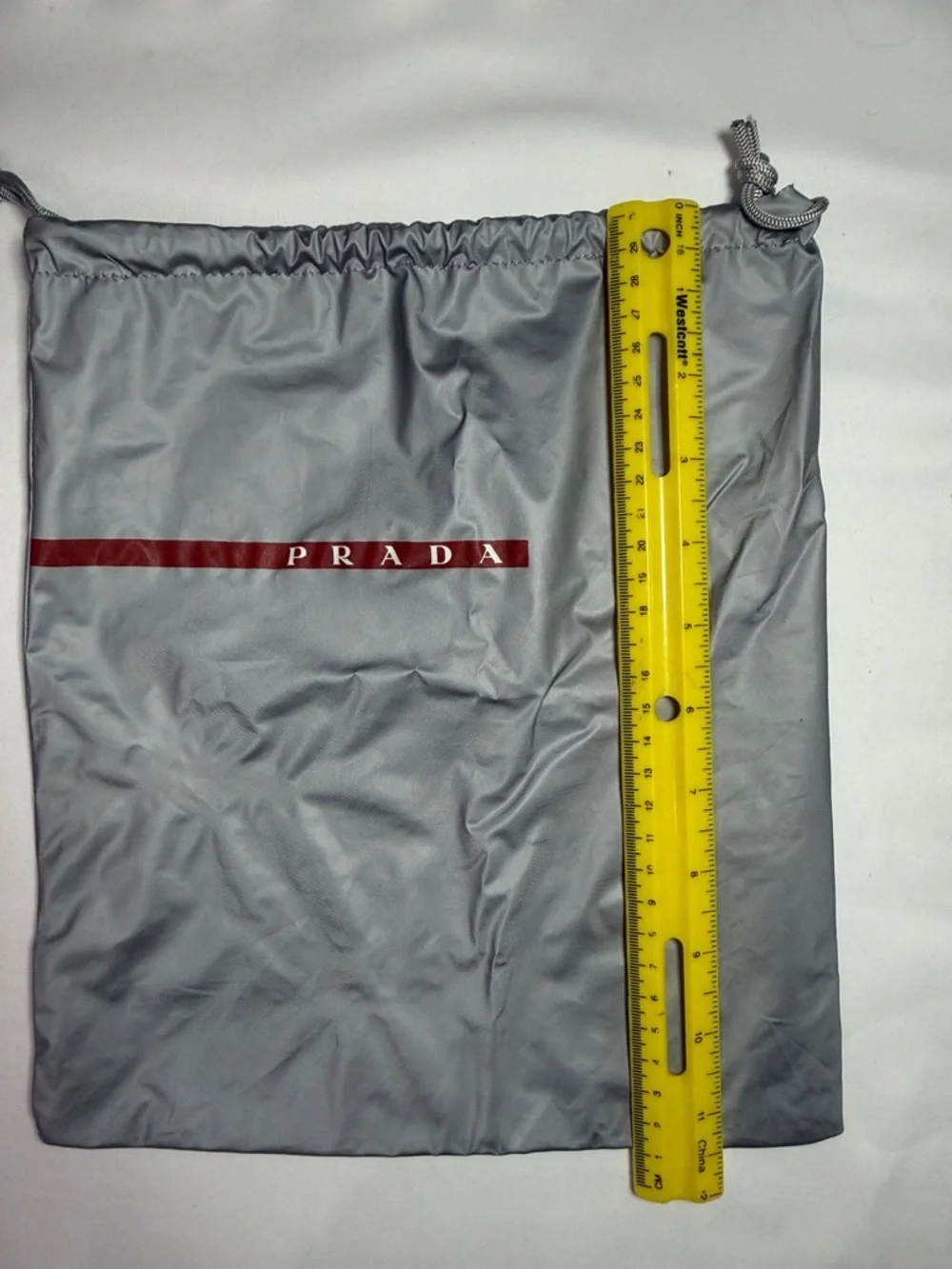 Prada Silver-Gray Drawstring Dust Bag with Red Logo Stripe